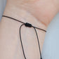Simple black tourmaline bracelet on cord