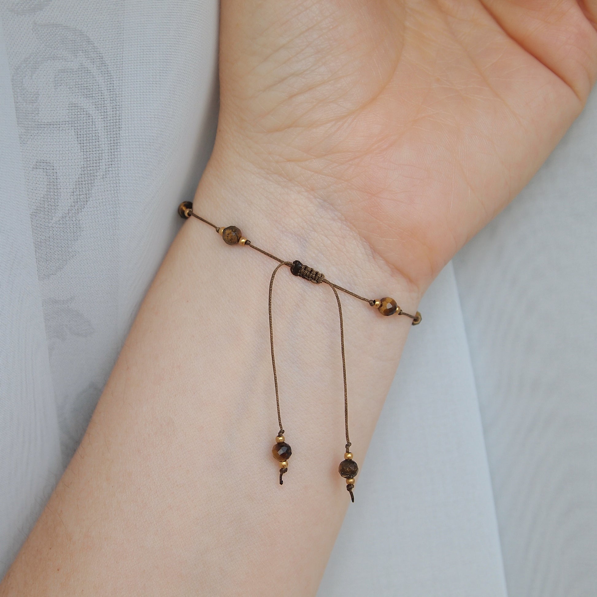 adjustable cord bracelet with gemstones